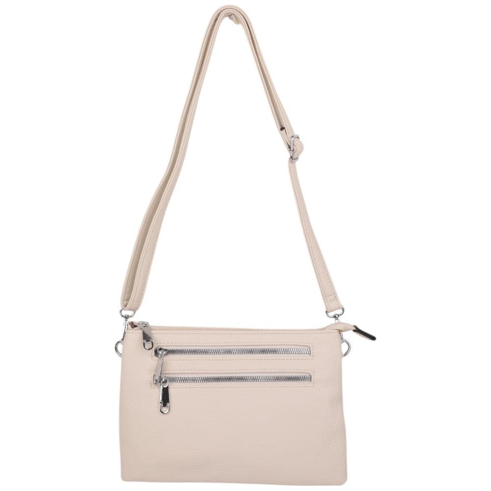 Front view of the beige shoulder bag with an adjustable strap and zippered closure.