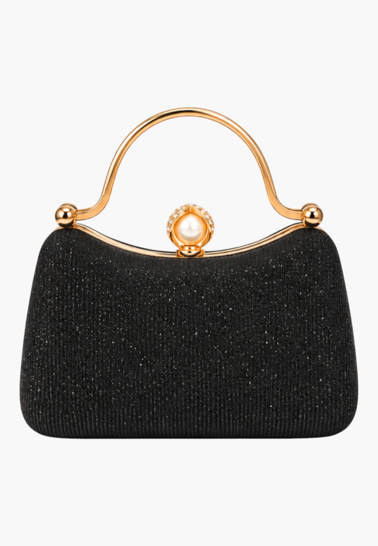 Back view of the black handbag featuring a smooth back and gold handle.
