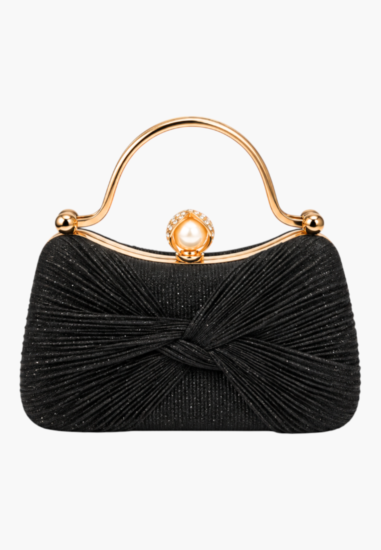 Front view of the black handbag with twisted design and gold handle.
