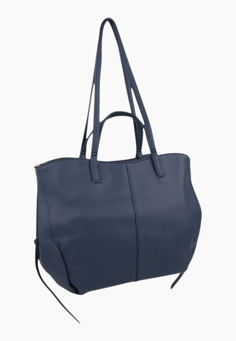 Side view of a navy tote bag showcasing its spacious design and two handles.