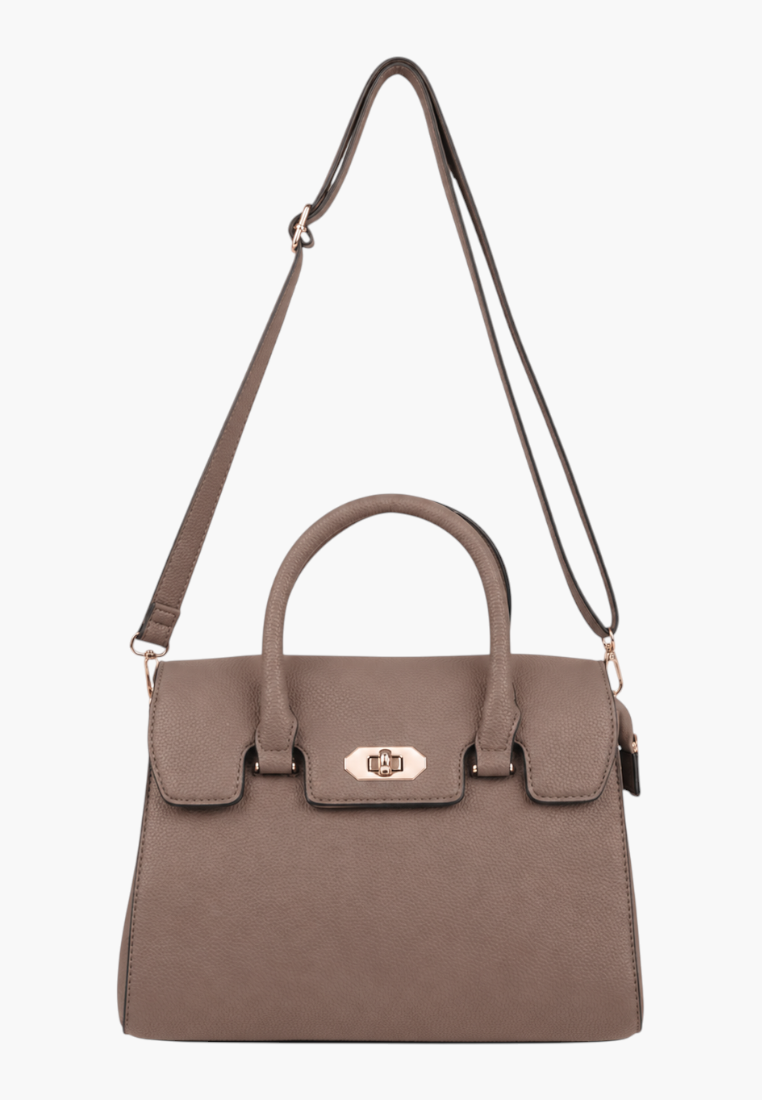Back view of a brown handbag featuring an adjustable strap and flap closure on a white background.