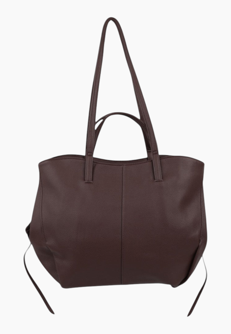 Back view of a brown tote bag with two handles on a white background.
