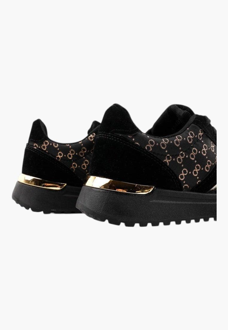 Czarno-złote sneakersy damskie z zamszu, widok z boku z teksturowanym wzorem.