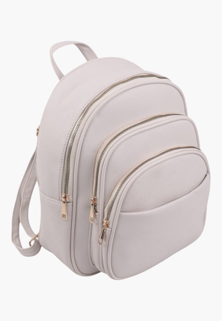 Falio beige faux leather urban backpack with multiple zippered compartments and a spacious main interior.