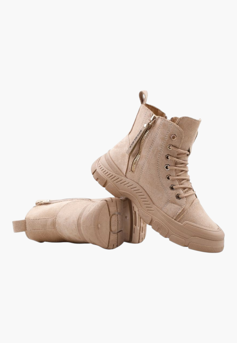 Falio beige faux suede lace-up ankle boots with thick flat tread soles and side zipper closure