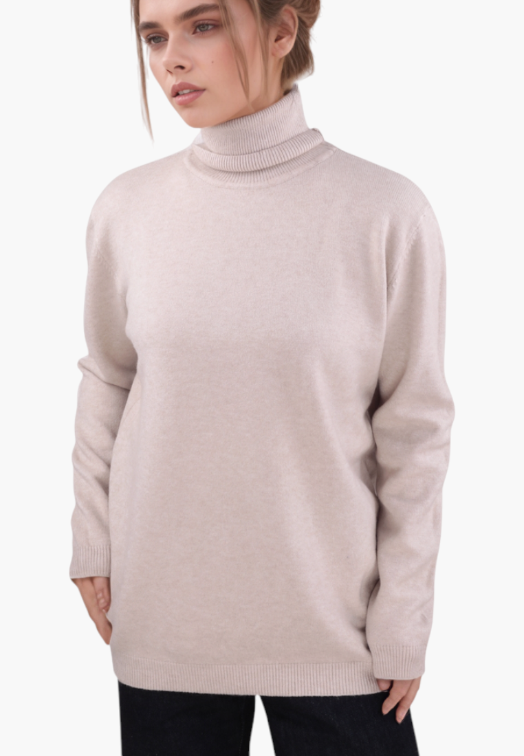 Falio beige viscose turtleneck sweater worn by a model, featuring a classic fit and long sleeves