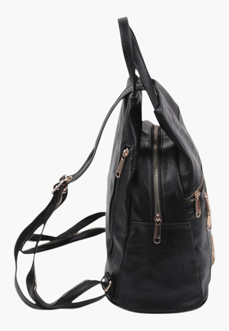 Falio small black faux leather urban backpack with multiple zippered pockets and adjustable straps, side view