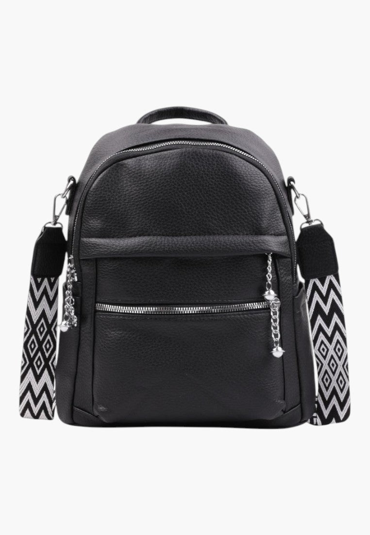 Falio black faux leather urban backpack with A4 capacity, featuring patterned straps and silver zipper details.