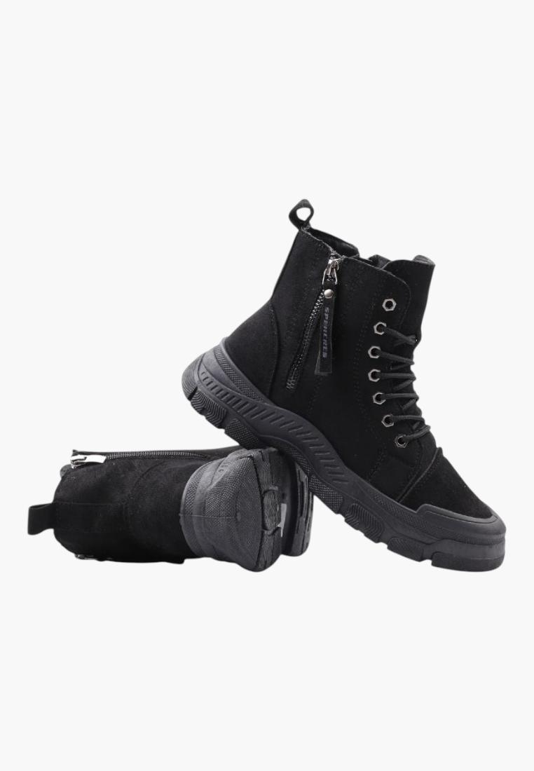 Falio black faux suede ankle boots with thick lug soles, side zippers, and lace-up closure for winter wear.
