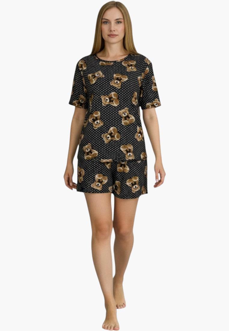 Falio black cotton pajama set with teddy bear print and white polka dots. Short sleeves and shorts for comfortable sleepwear.