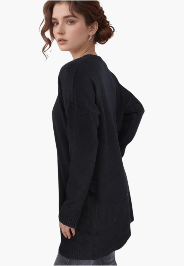 Falio black wool and cashmere blend sweater with a round neckline worn by a model, side view