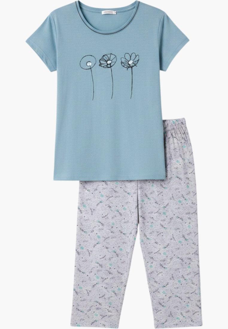 Falio women's blue cotton pajama set with short sleeves and 3/4 length pants featuring a floral print and round neckline.