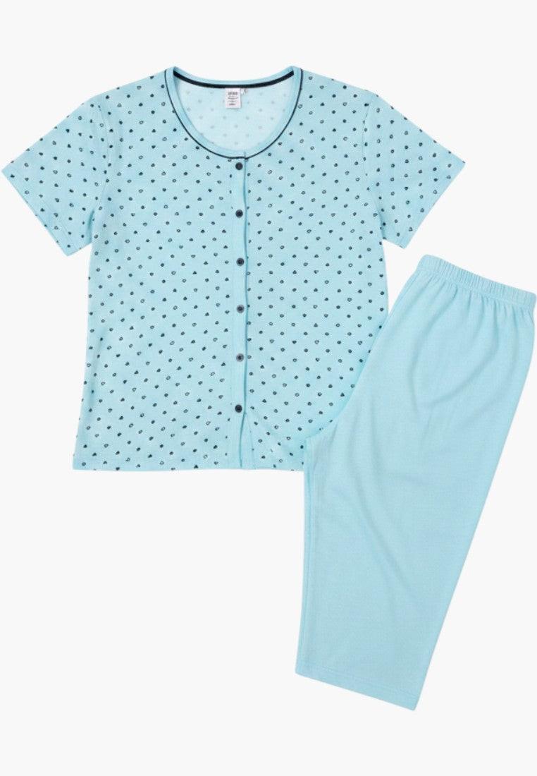 Falio light blue cotton pajama set with navy blue heart print, short sleeves, round neck, and button-up front. Includes 3/4 length capri pants.