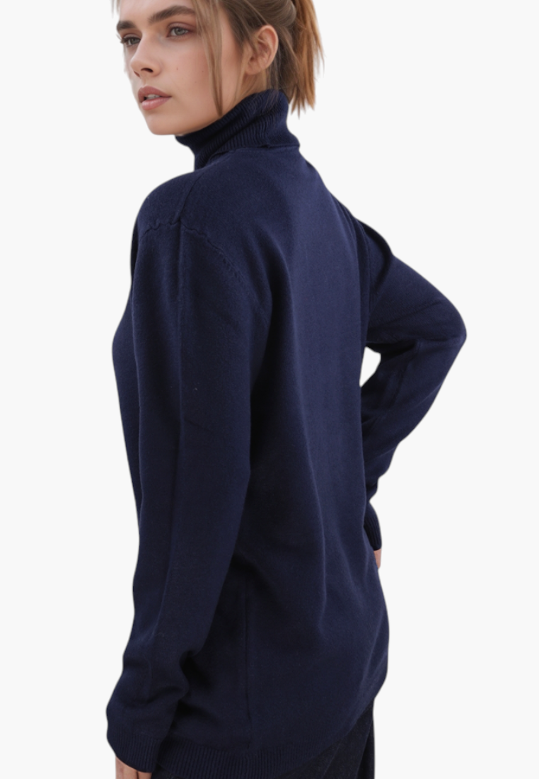 Falio blue mock neck sweater in a soft viscose blend worn by a model, featuring long sleeves and a classic fit.