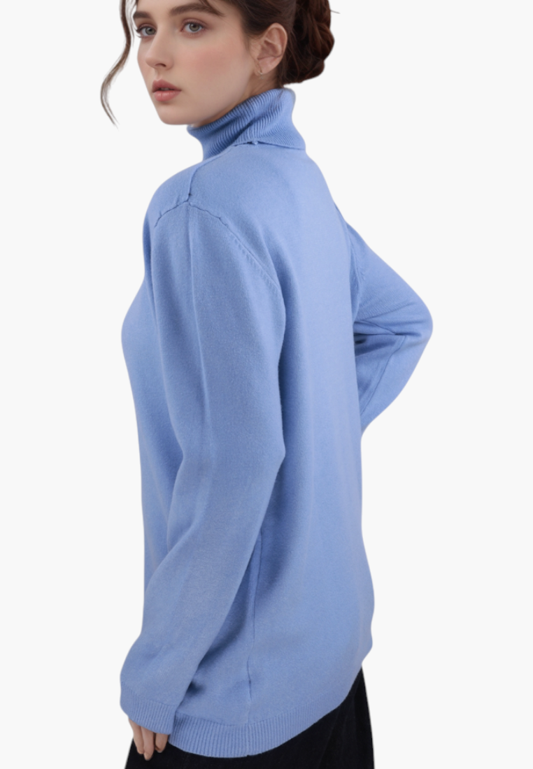 Falio plus size blue viscose turtleneck sweater worn by a model, side view showing long sleeves and classic fit.