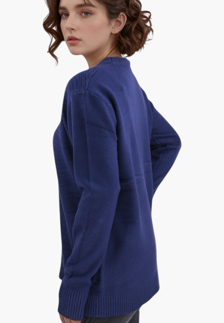Model wearing a blue Falio wool and cashmere blend sweater with a round neckline and long sleeves, side view