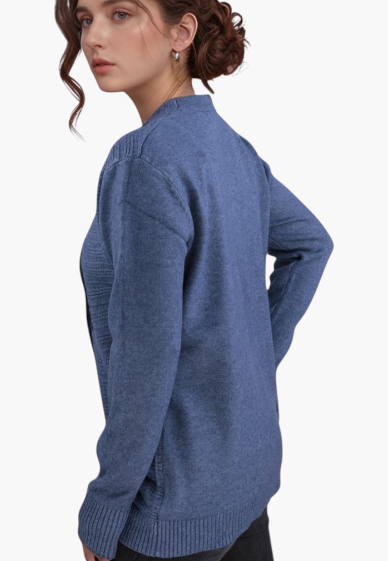 Model wearing a blue Falio wool and cashmere blend sweater with a round neckline and long sleeves