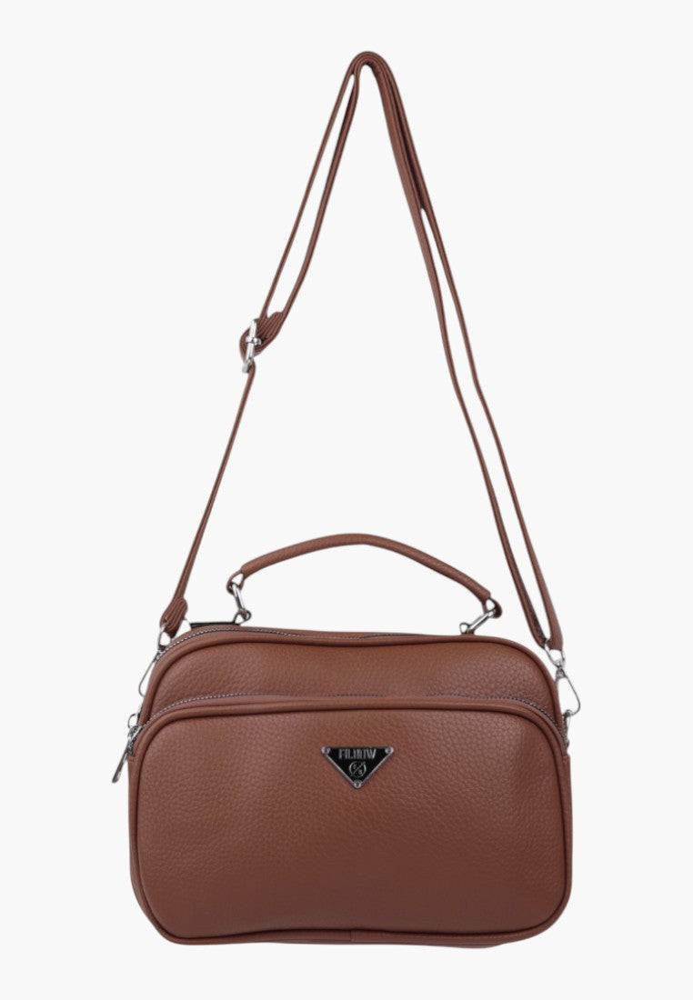 Falio brown faux leather crossbody bag with top handle, multiple zipper compartments, and silver logo hardware.
