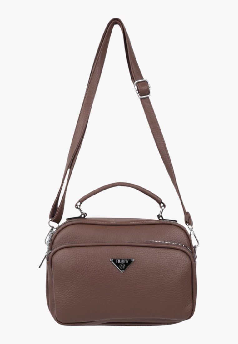 Falio brown faux leather crossbody bag with adjustable strap, top handle, and multiple zippered compartments.