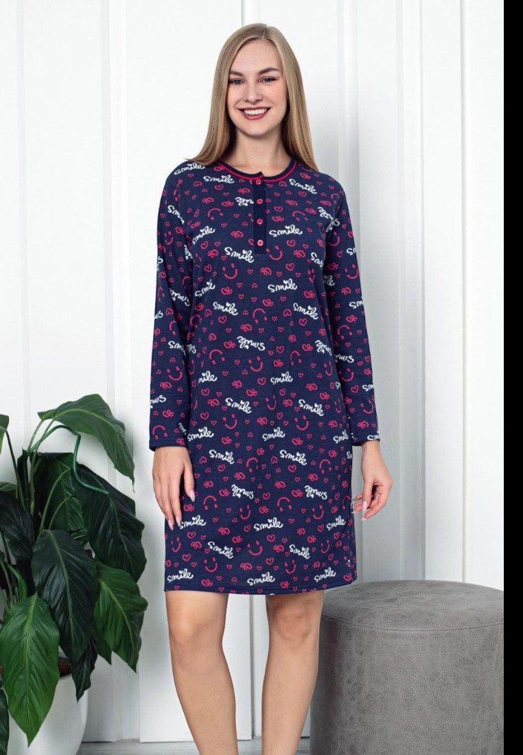 Falio navy blue 100% cotton long-sleeve nightgown with all-over pink smile and heart print. Round neckline with button placket.