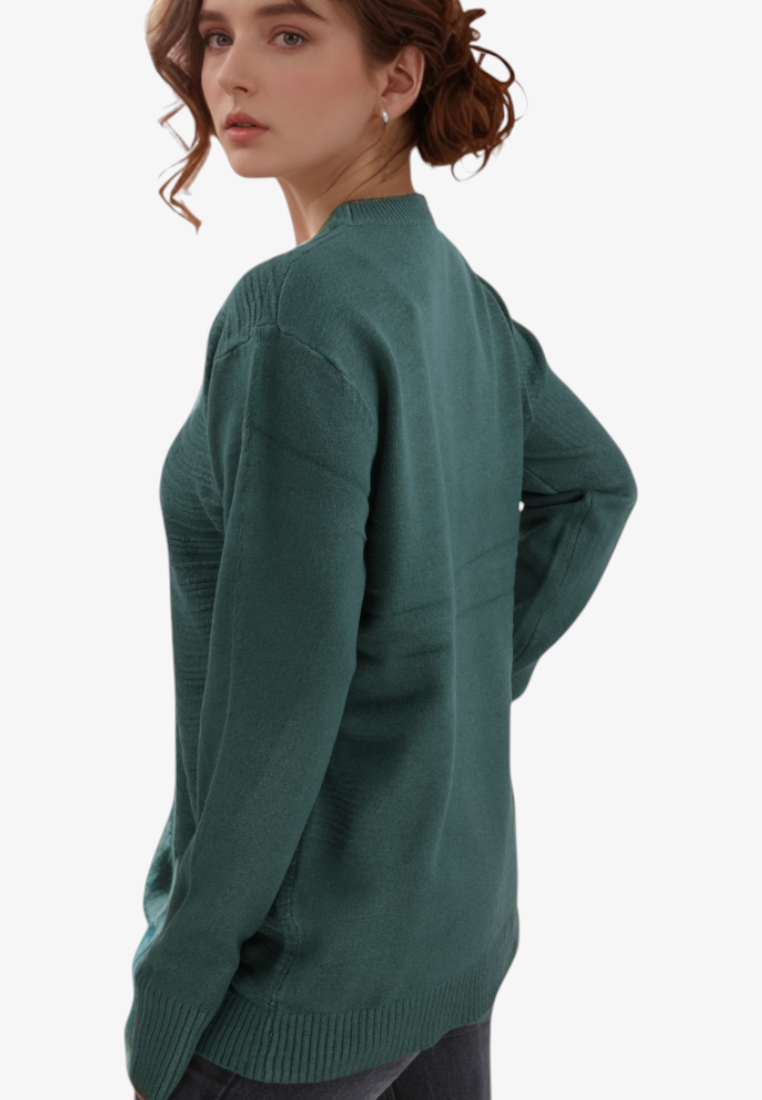 Model wearing a Falio green wool and cashmere blend sweater with a round neckline and long sleeves