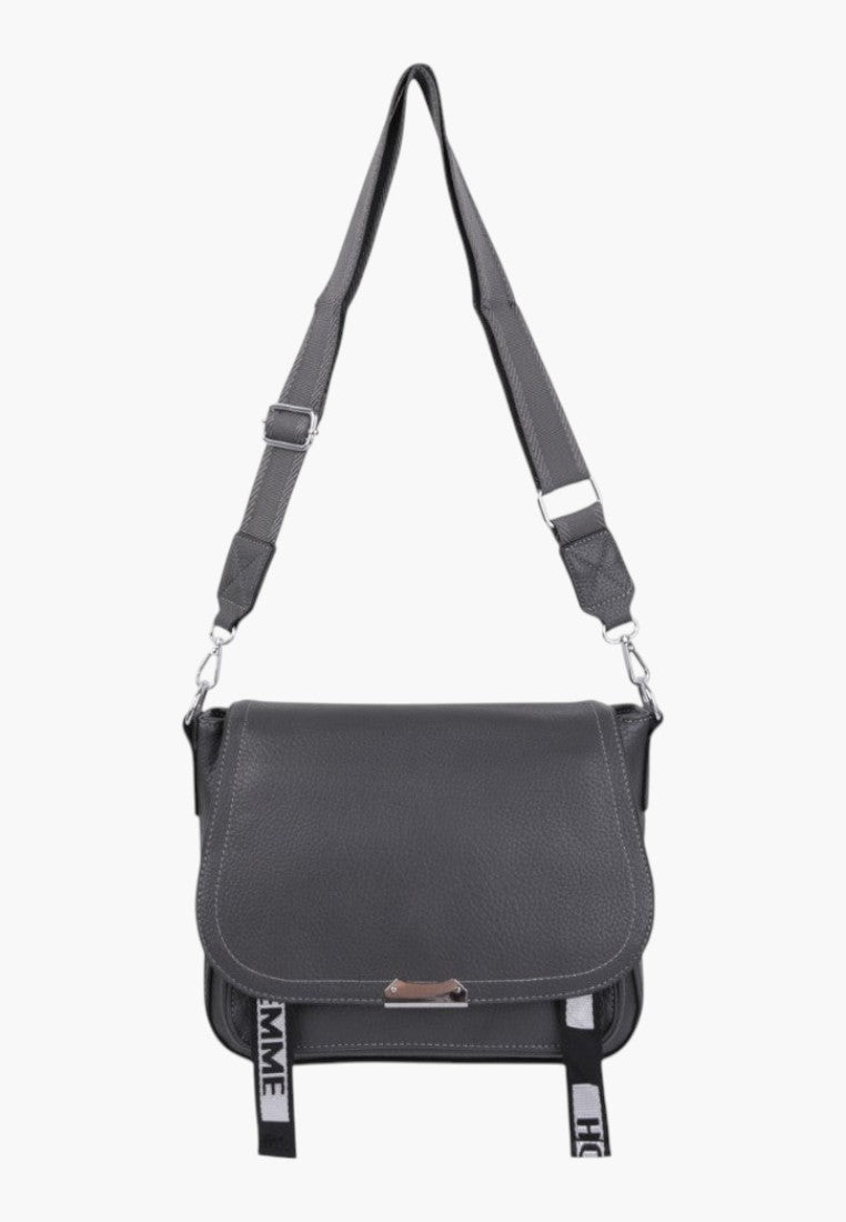 Falio grey faux leather crossbody bag with flap closure, adjustable strap, and decorative branded ribbon accents.