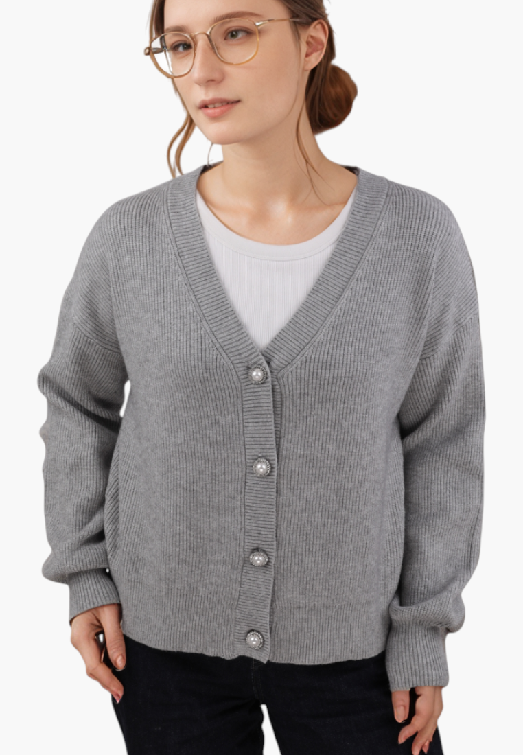 Falio grey V-neck button-up cardigan worn by a woman with glasses, featuring a ribbed knit design.