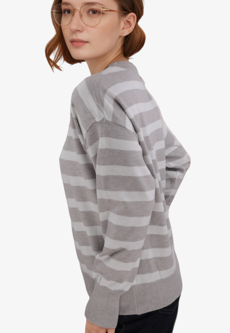 Falio grey striped long-sleeve sweater with a round neckline worn by a woman with glasses