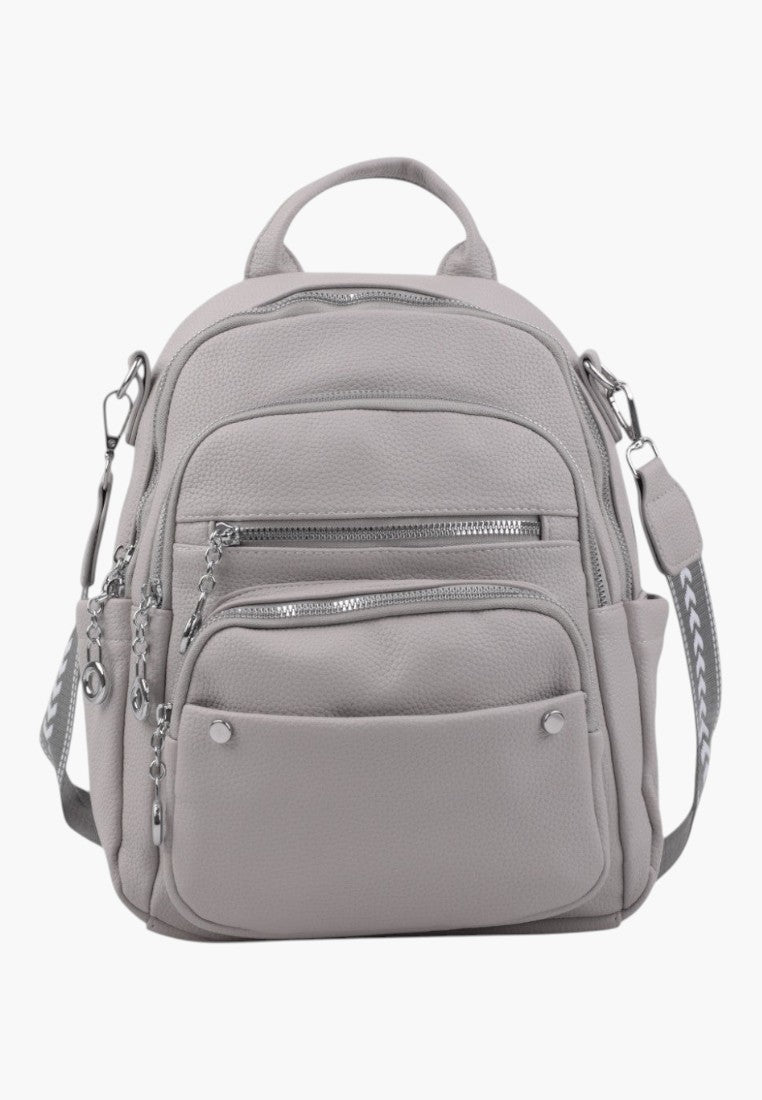 Falio grey urban women's backpack with multiple zippered pockets, silver hardware, and a patterned shoulder strap.