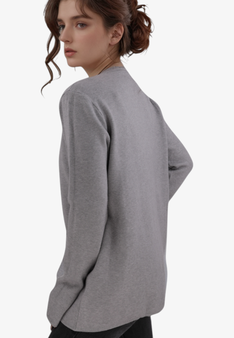 Falio plus size grey viscose sweater with long sleeves and round neckline worn by a woman, side view
