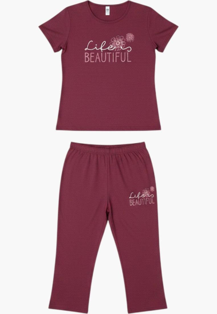 Falio women's plum cotton pajama set with short sleeves and 3/4 length pants featuring a 'life is beautiful' graphic.
