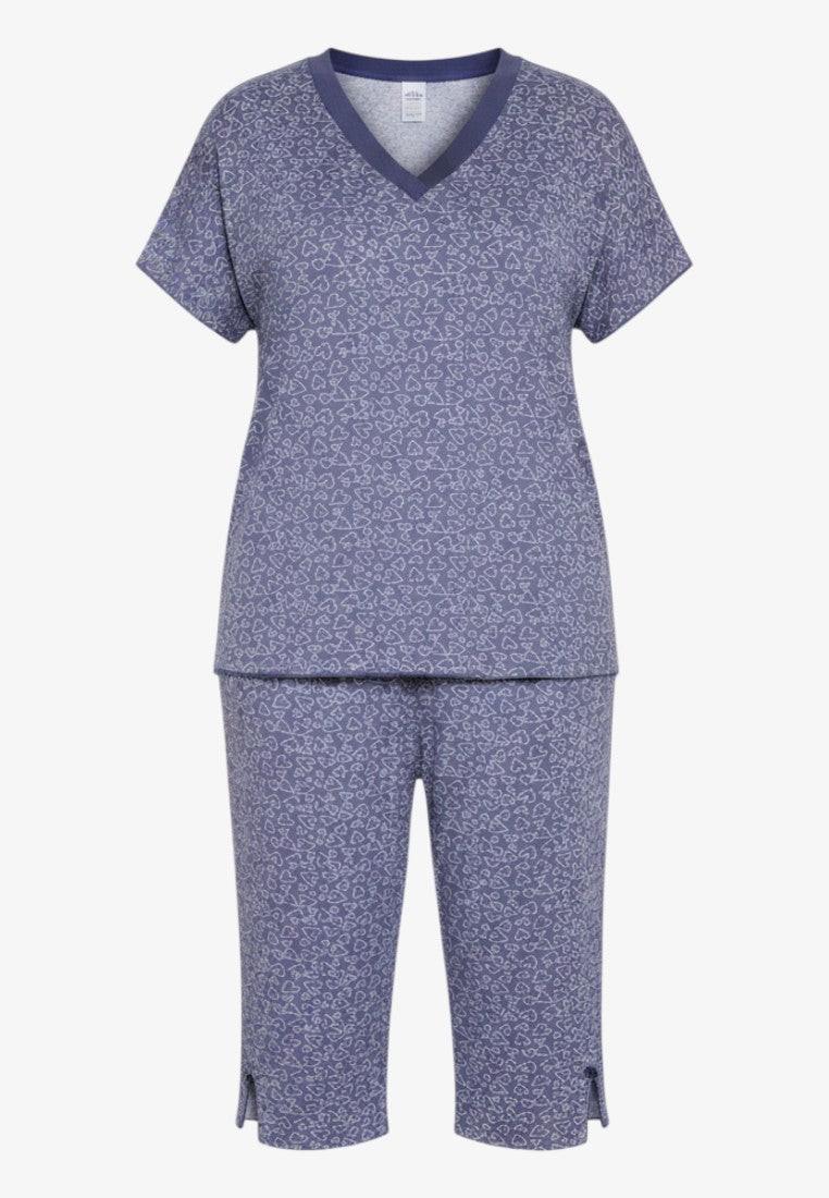 Falio plus size women's multi-colored viscose pajama set with short sleeves and 3/4 length pants featuring a V-neck and heart pattern.