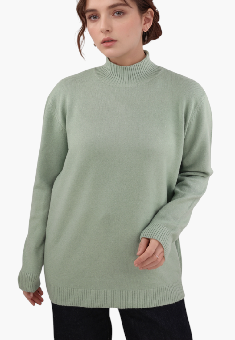 Falio women's sage green viscose blend sweater with a mock neck and long sleeves worn by a model