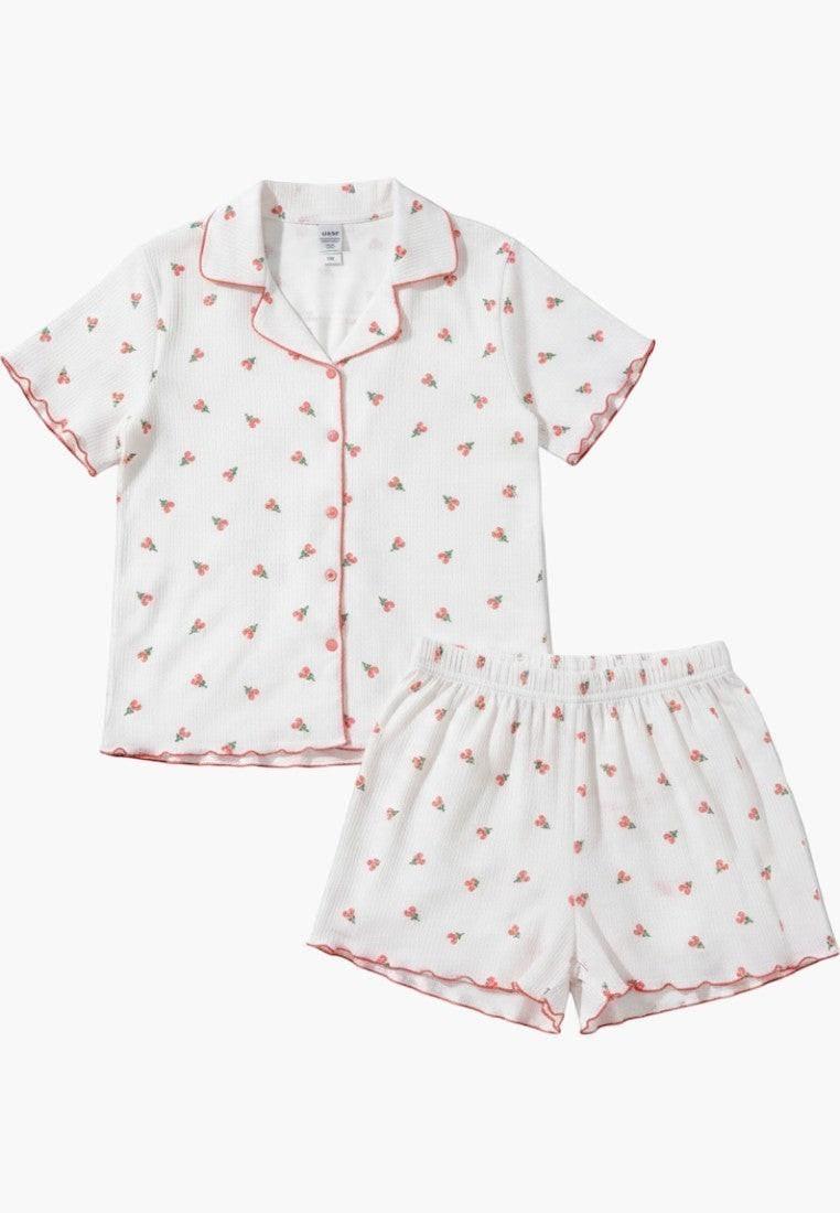 Falio white 100% cotton short pajama set with pink cherry print, V-neck, short sleeves, and button closure.