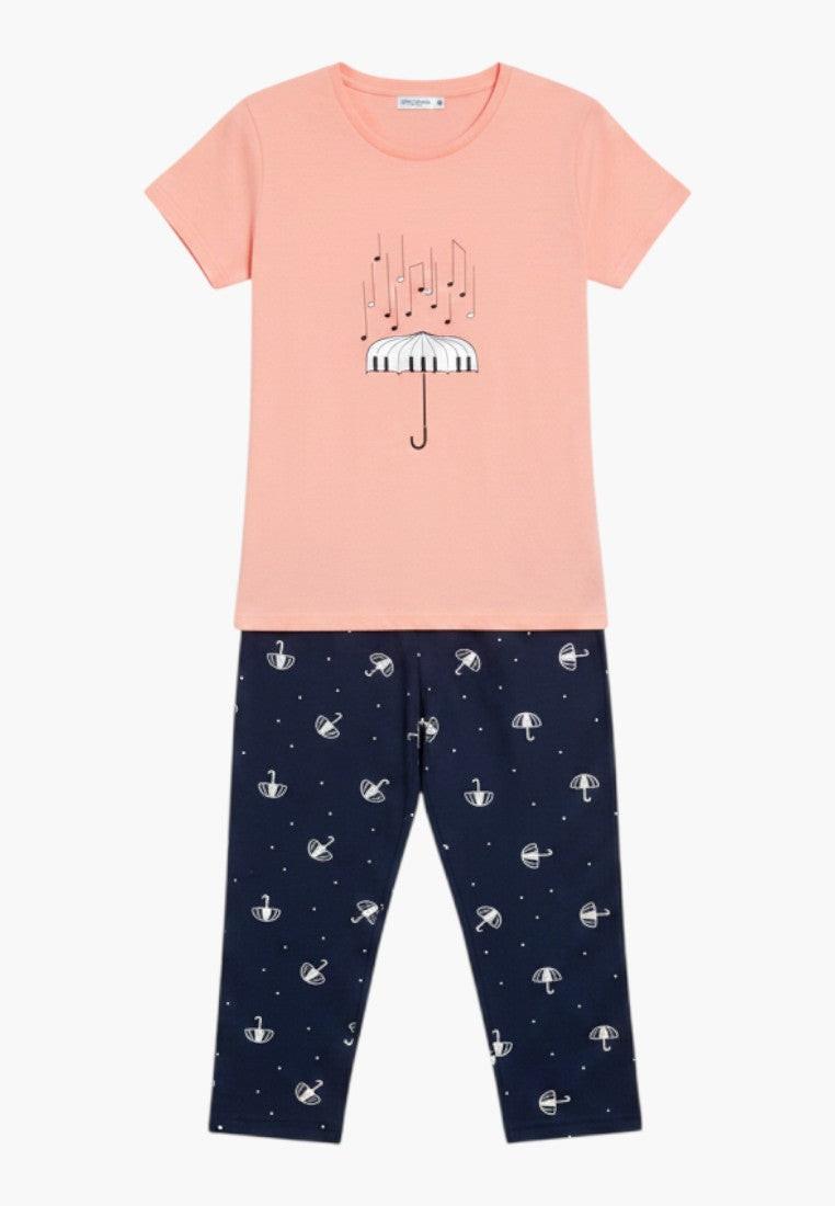 Falio women's coral cotton pajama set with short sleeves, round neck, and 3/4 length pants featuring an umbrella and musical notes print.
