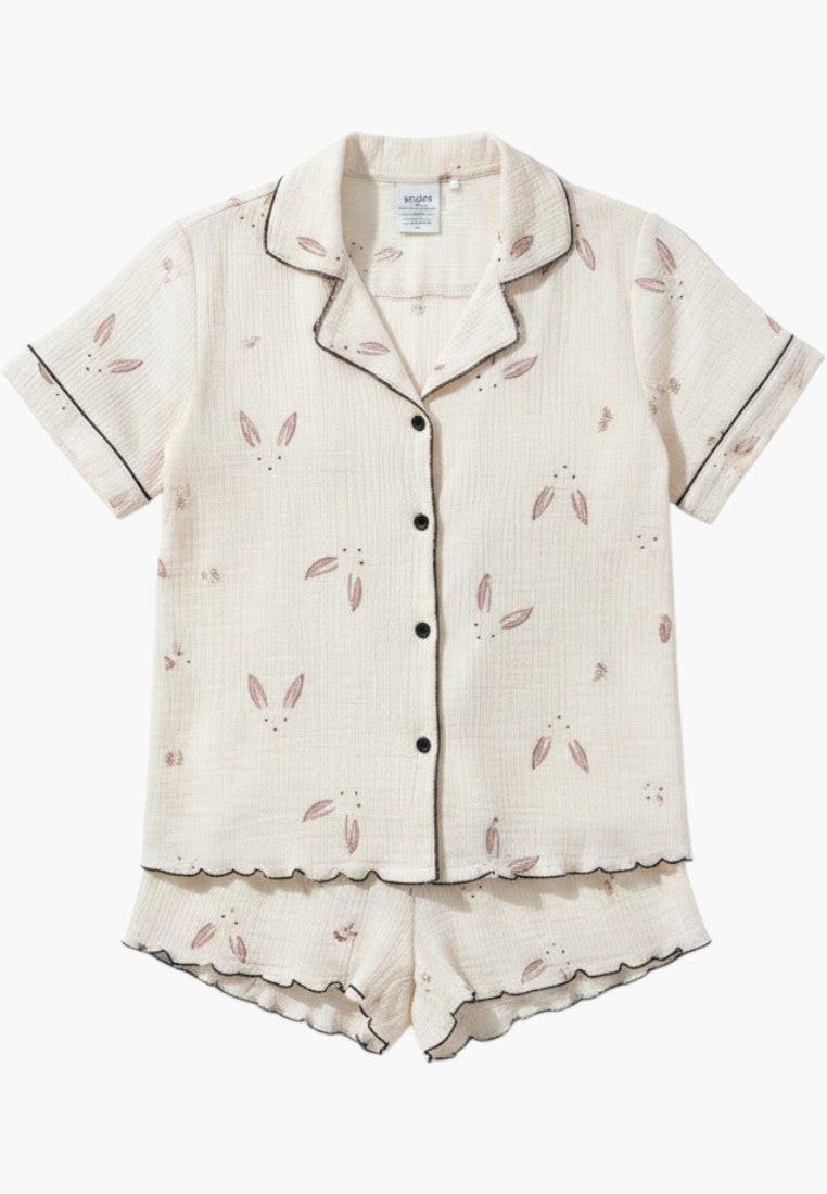 Falio women's multi-colored 100% cotton short pajama set with bunny print, V-neck, short sleeves, and button closure.