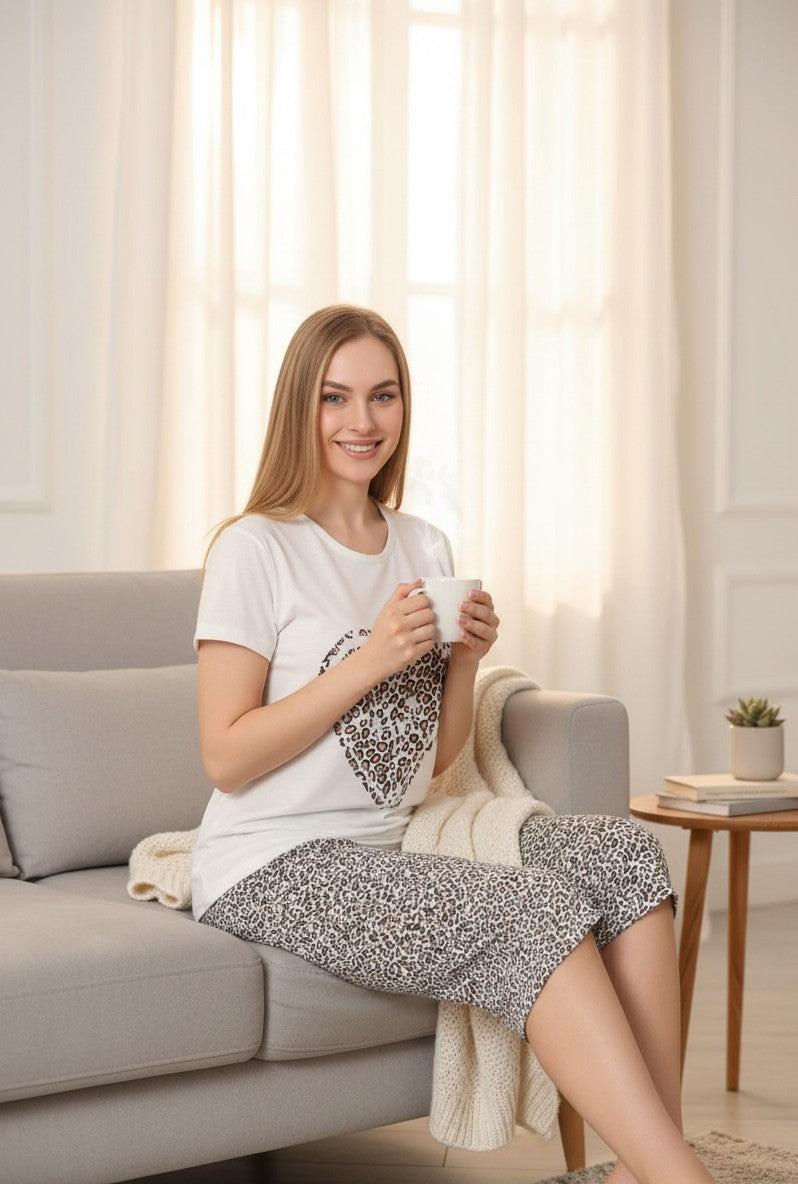 Falio white cotton t-shirt with leopard print heart graphic and matching 3/4 leopard print capri pants for women.