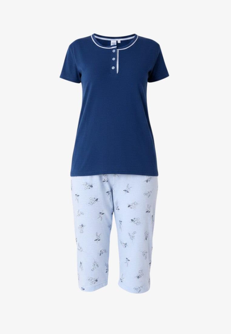 Falio women's navy blue cotton short sleeve pajama set with light blue floral print capri pants and a round neckline with buttons.