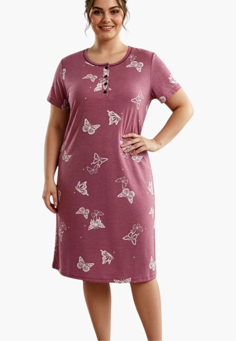 Lifestyle shot of a floral dress with purple and white colors, featuring short sleeves and a round neckline.
