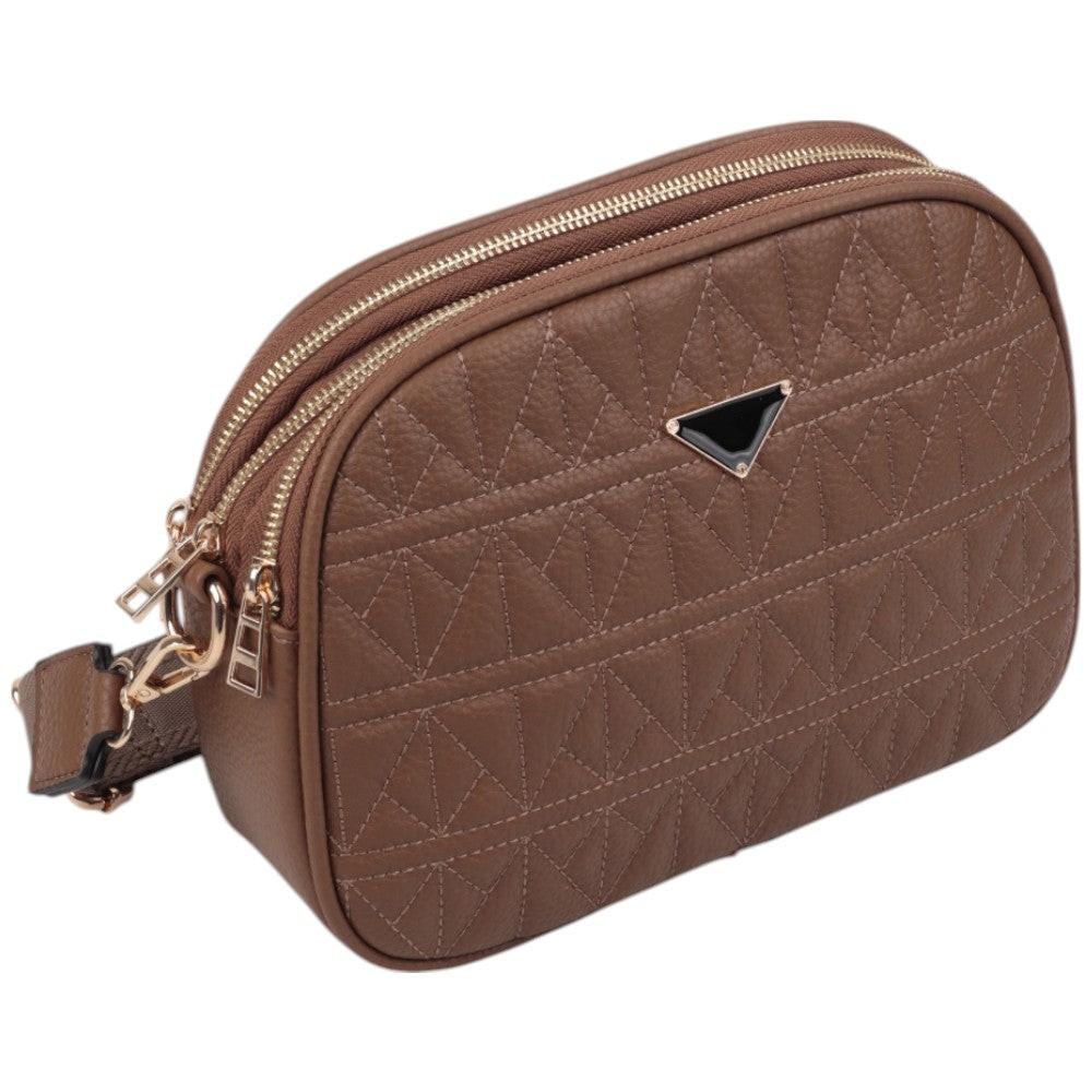 Side view of a brown handbag featuring a double zipper and logo detail against a white background.