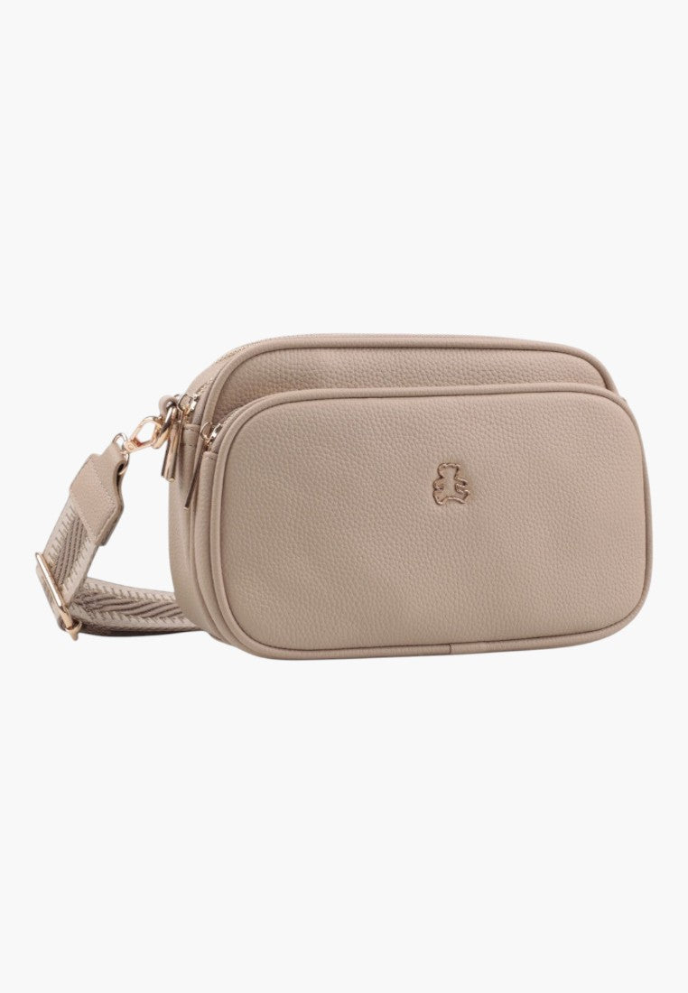 Front view of a khaki crossbody bag with zipper closure and adjustable strap.