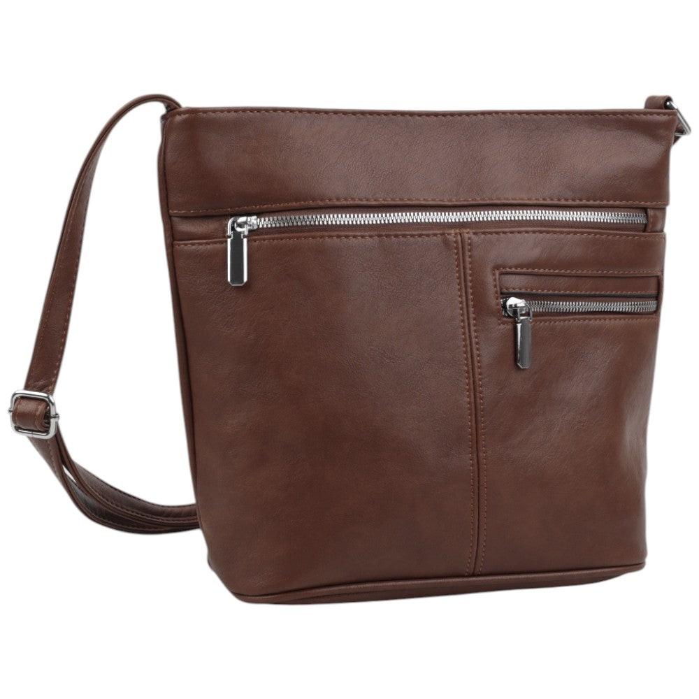 Front view of the brown leather handbag with zipper closure and front pocket.