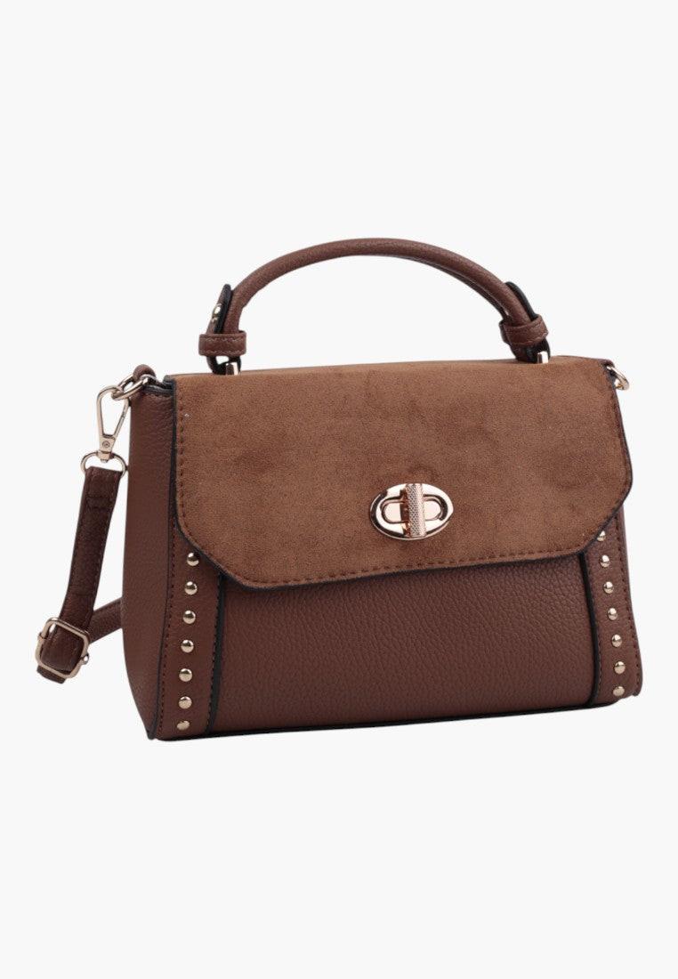 Front view of the brown handbag with zipper closure and silver hardware on a white background.