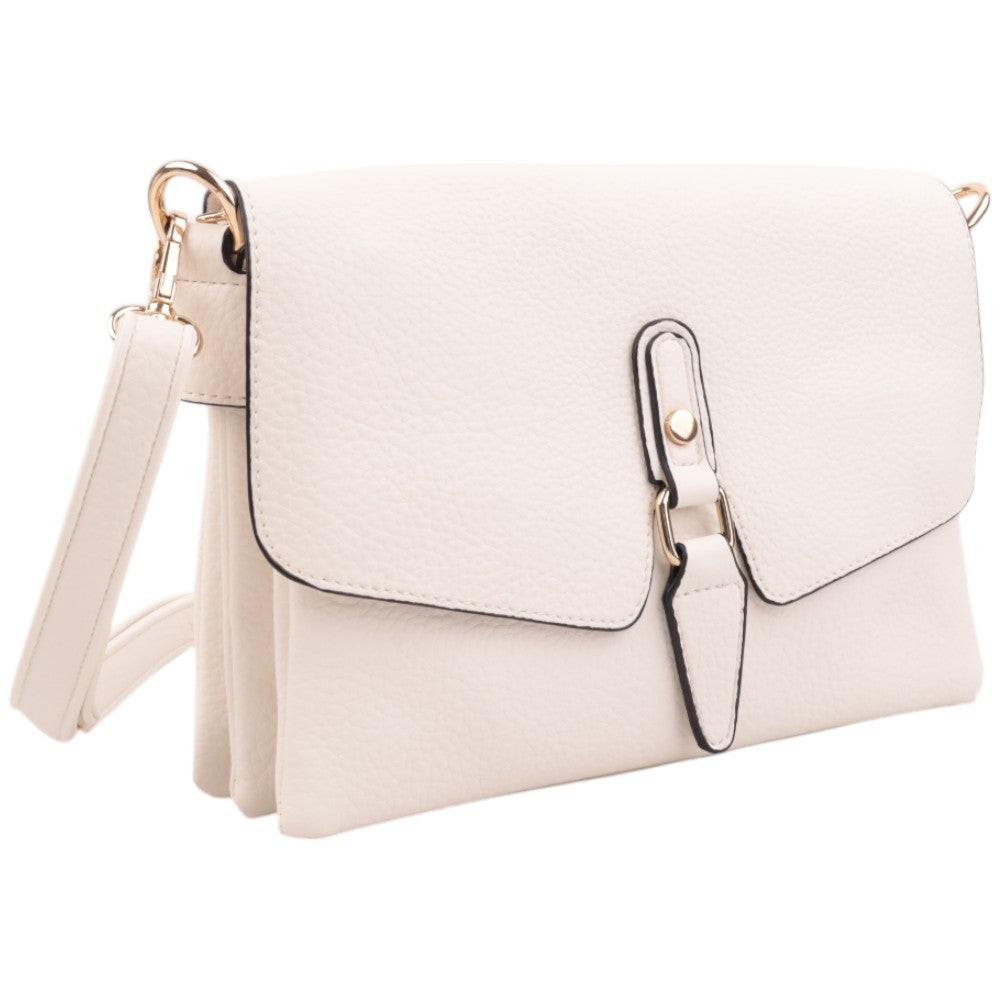 Front view of a white handbag with flap closure and gold hardware.