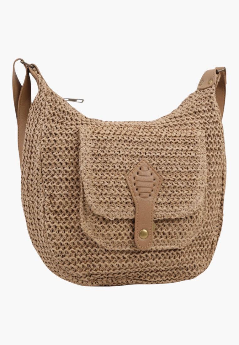Front view of the woven handbag in brown with a front flap on a white background.