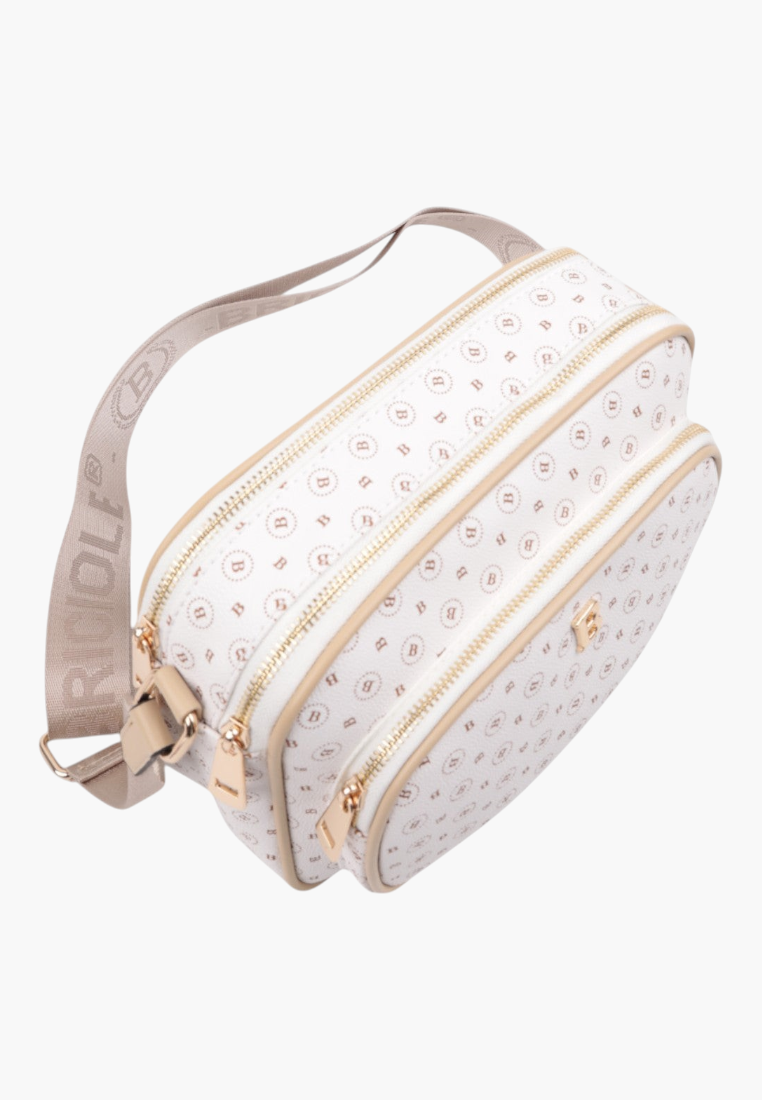 Side view of the off-white crossbody bag with monogram pattern and adjustable shoulder strap.