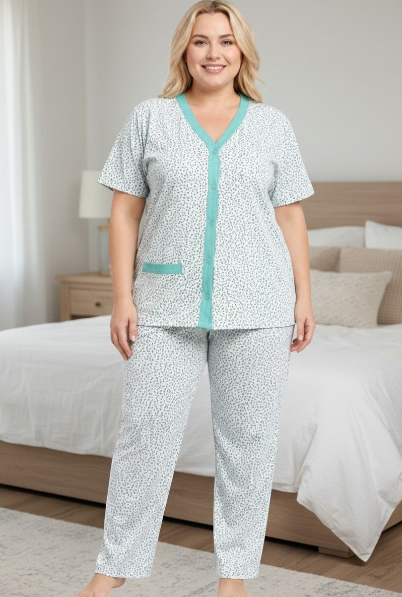 Front view of patterned cotton pajamas featuring a white and green design.
