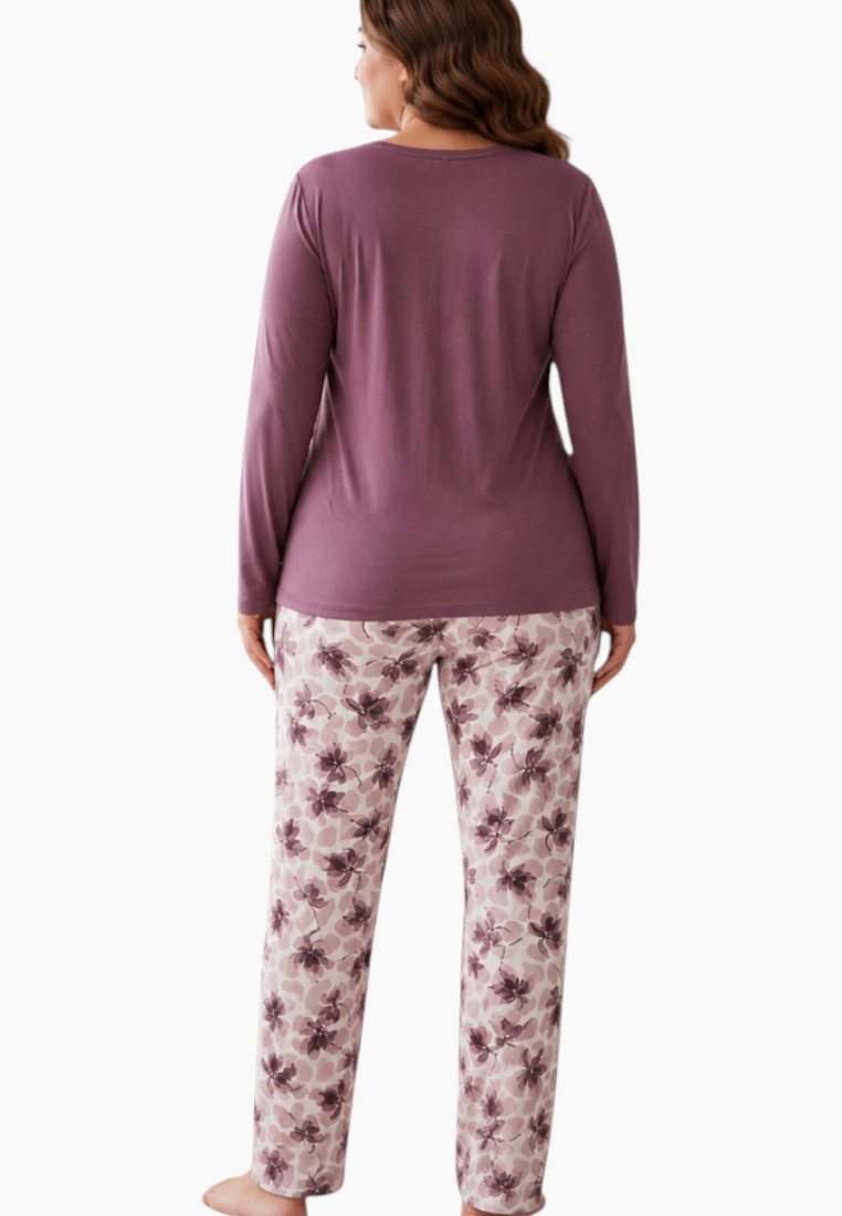 Detail close-up of the purple pajama set showing floral print pants.