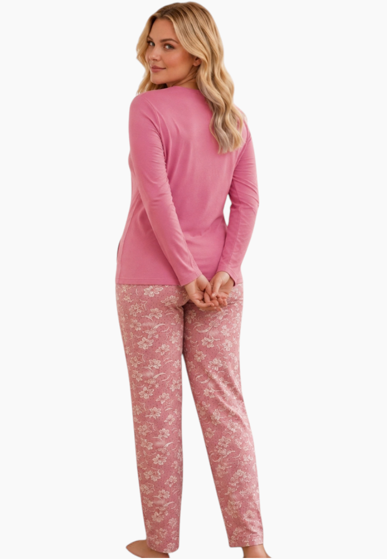 Front view of a pink floral pajama set with long sleeves on a white background.