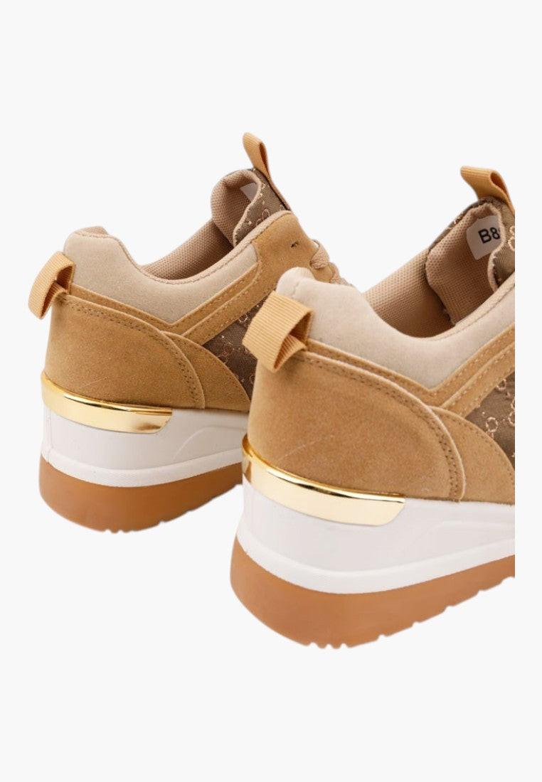 Back view of brown and beige sneakers featuring a padded collar.